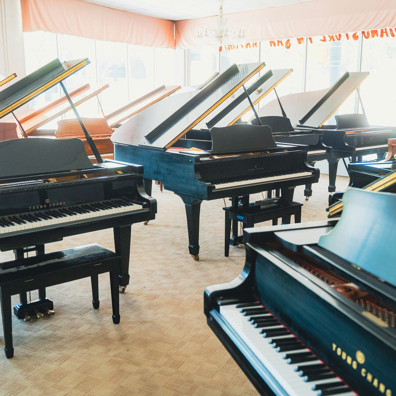 Grand Piano in white room