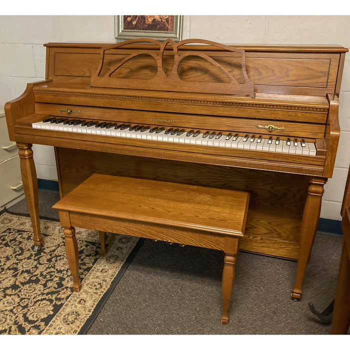 Baldwin 665 Oak Console Piano w/ bench